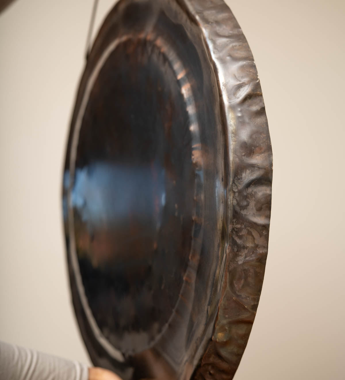 Rustic Black Gong for sound healing.