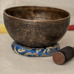 Handmade Himalayan lotus singing bowl carved design tuned to F3 and C5 for throat chakra sound healing