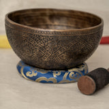 Handmade Himalayan lotus singing bowl carved design tuned to F3 and C5 for throat chakra sound healing