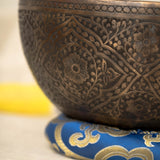 Handmade Himalayan lotus singing bowl carved design tuned to F3 and C5 for throat chakra sound healing