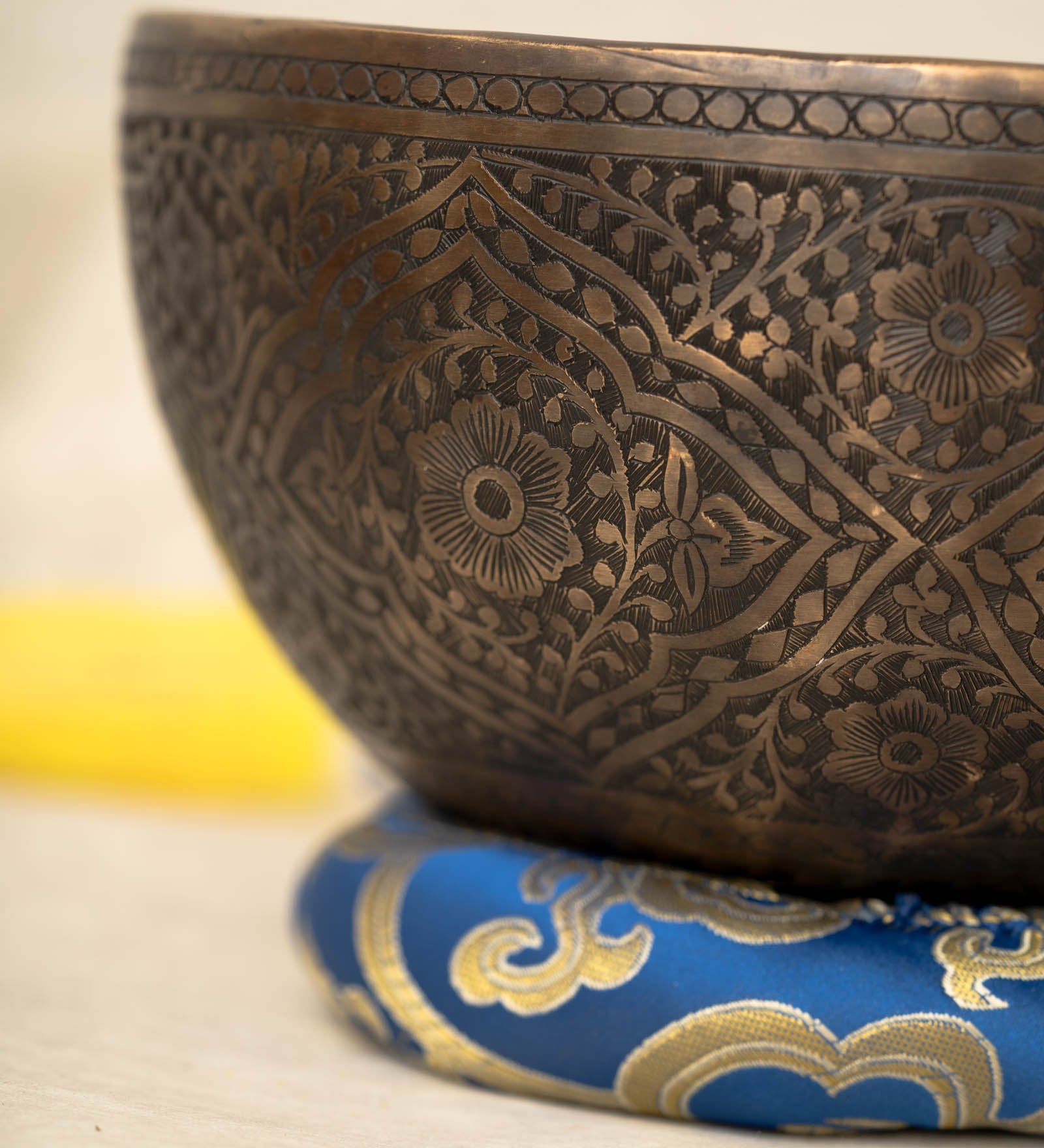 Handmade Himalayan lotus singing bowl carved design tuned to F3 and C5 for throat chakra sound healing