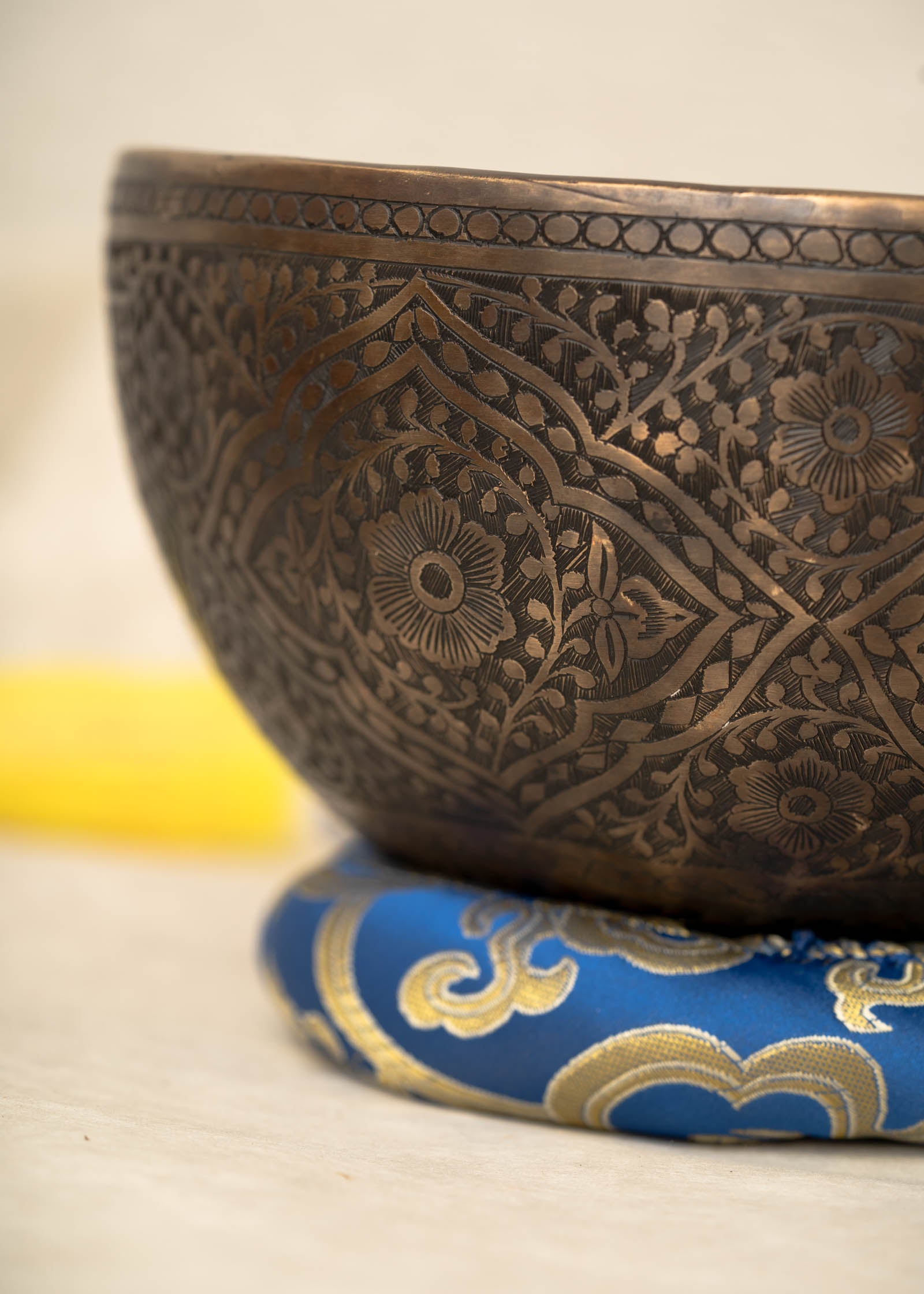 Handmade Himalayan lotus singing bowl carved design tuned to F3 and C5 for throat chakra sound healing