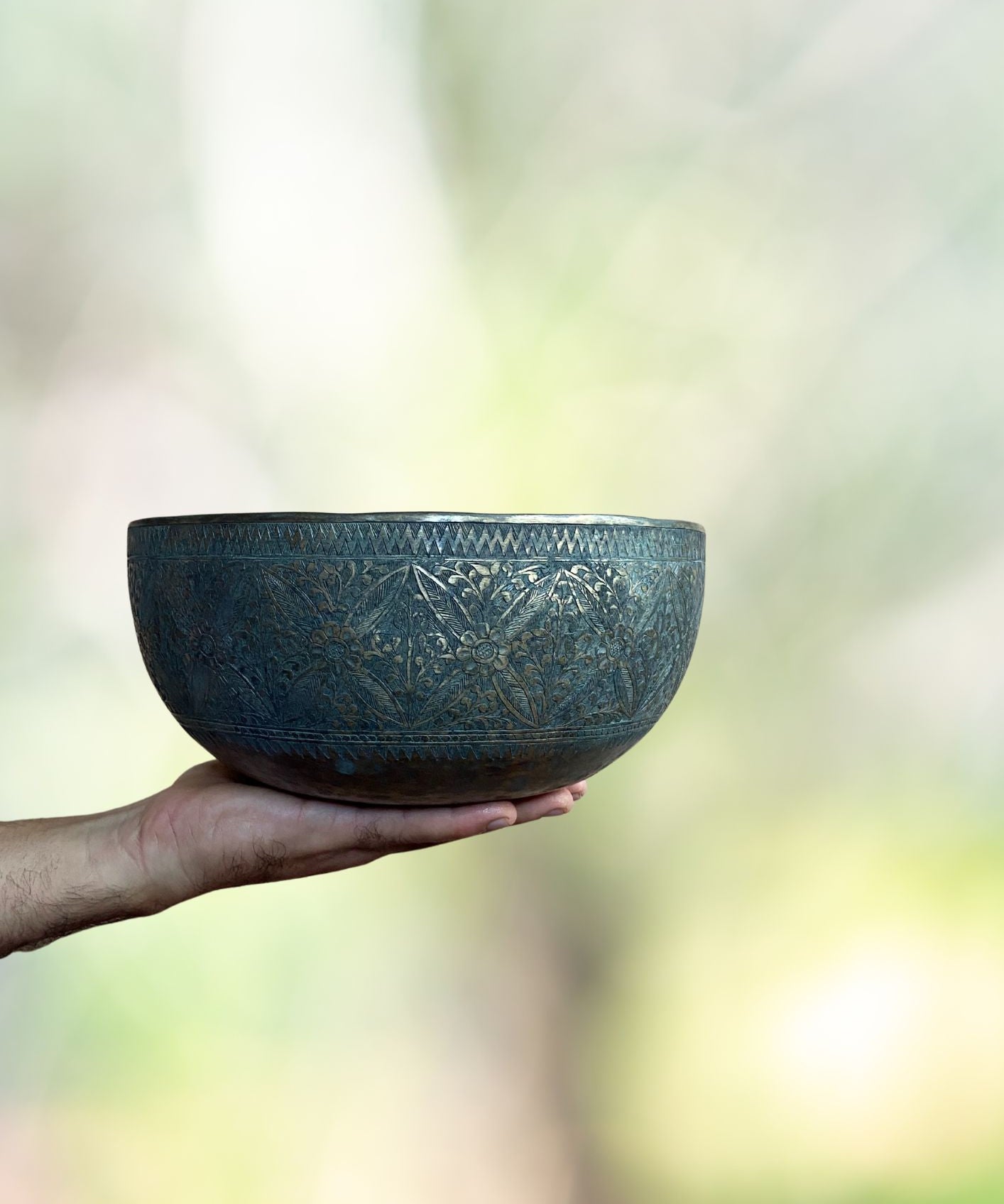 Vintage Flower Carved Singing Bowl for sound therapy.