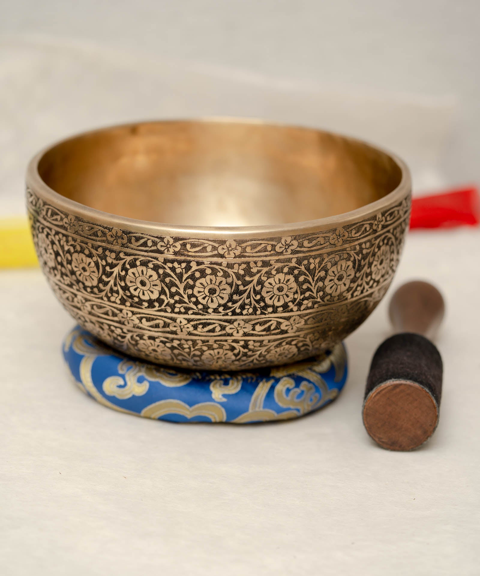 Full Lotus engraved  handmade Tibetan singing bowl with brass finish, wooden mallet, and cushion for Third Eye Chakra meditation