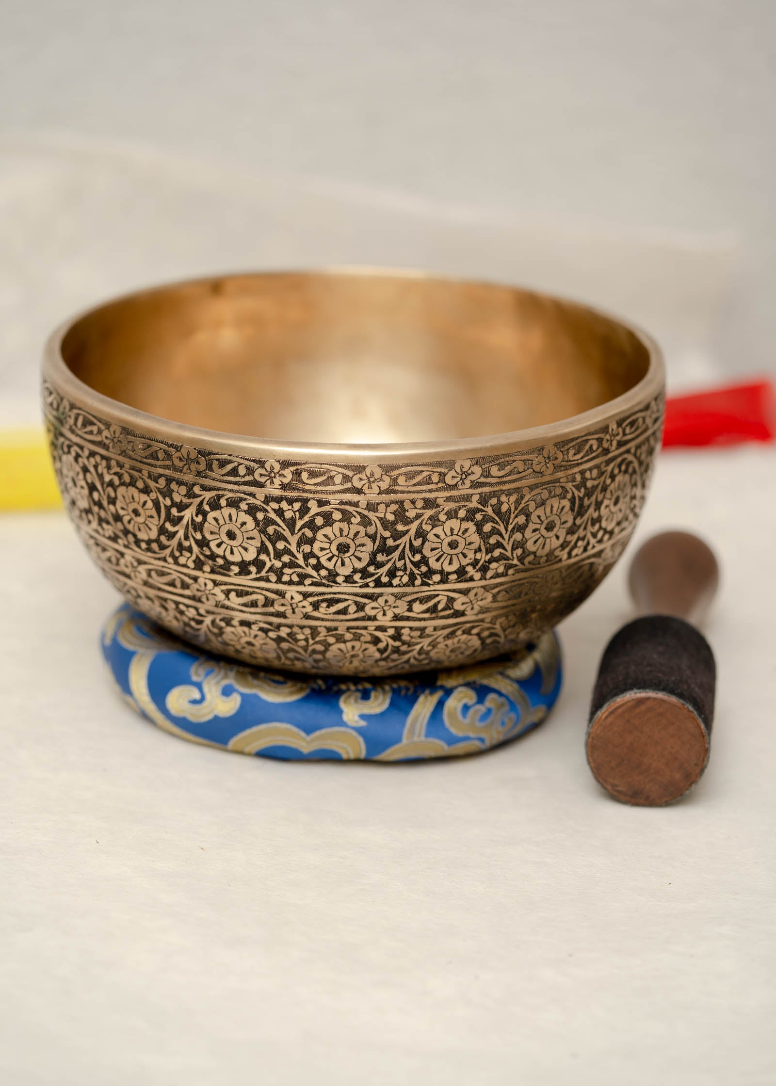 Full Lotus engraved  handmade Tibetan singing bowl with brass finish, wooden mallet, and cushion for Third Eye Chakra meditation
