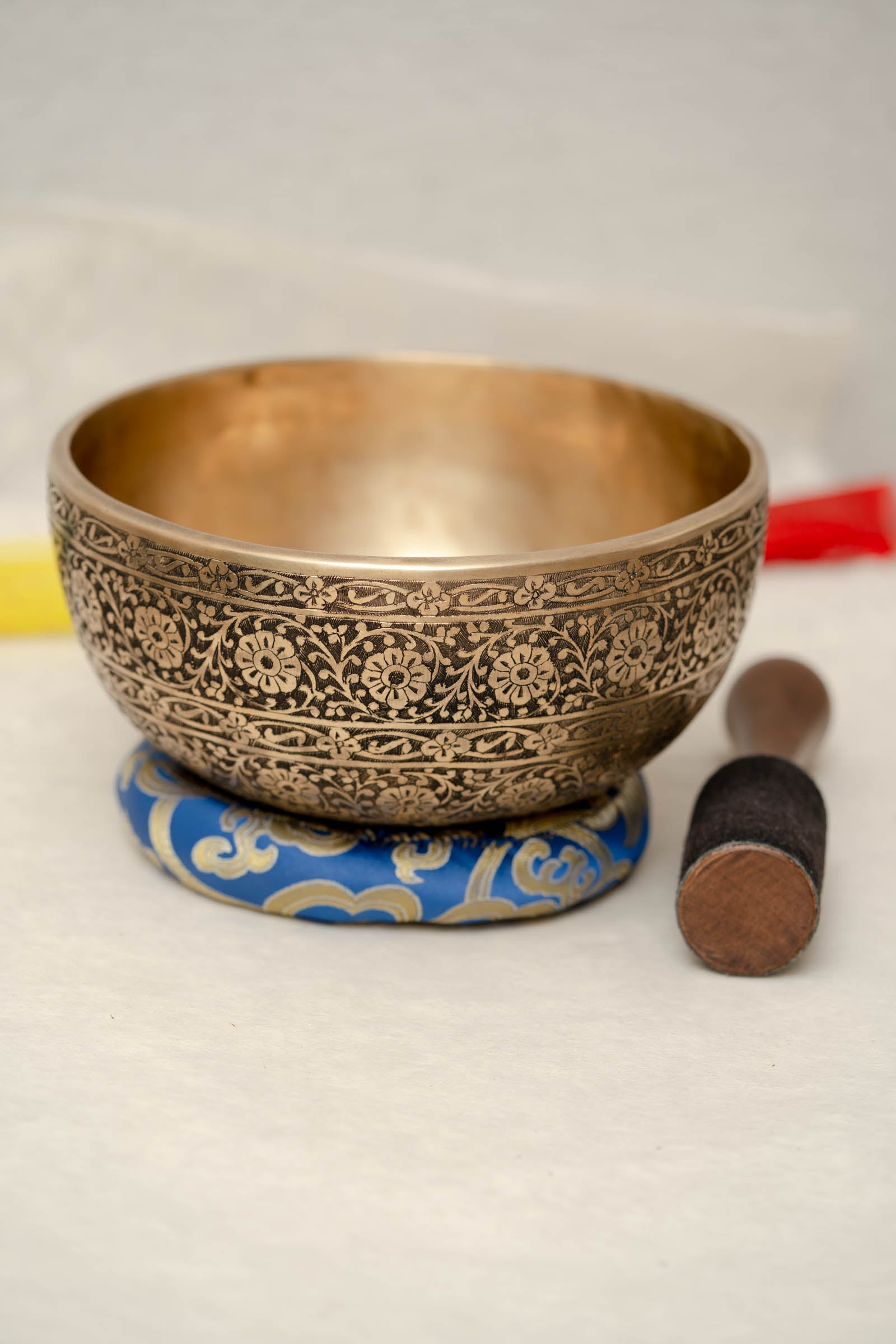 Full Lotus engraved  handmade Tibetan singing bowl with brass finish, wooden mallet, and cushion for Third Eye Chakra meditation