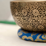 Full Lotus engraved  handmade Tibetan singing bowl with brass finish, wooden mallet, and cushion for Third Eye Chakra meditation