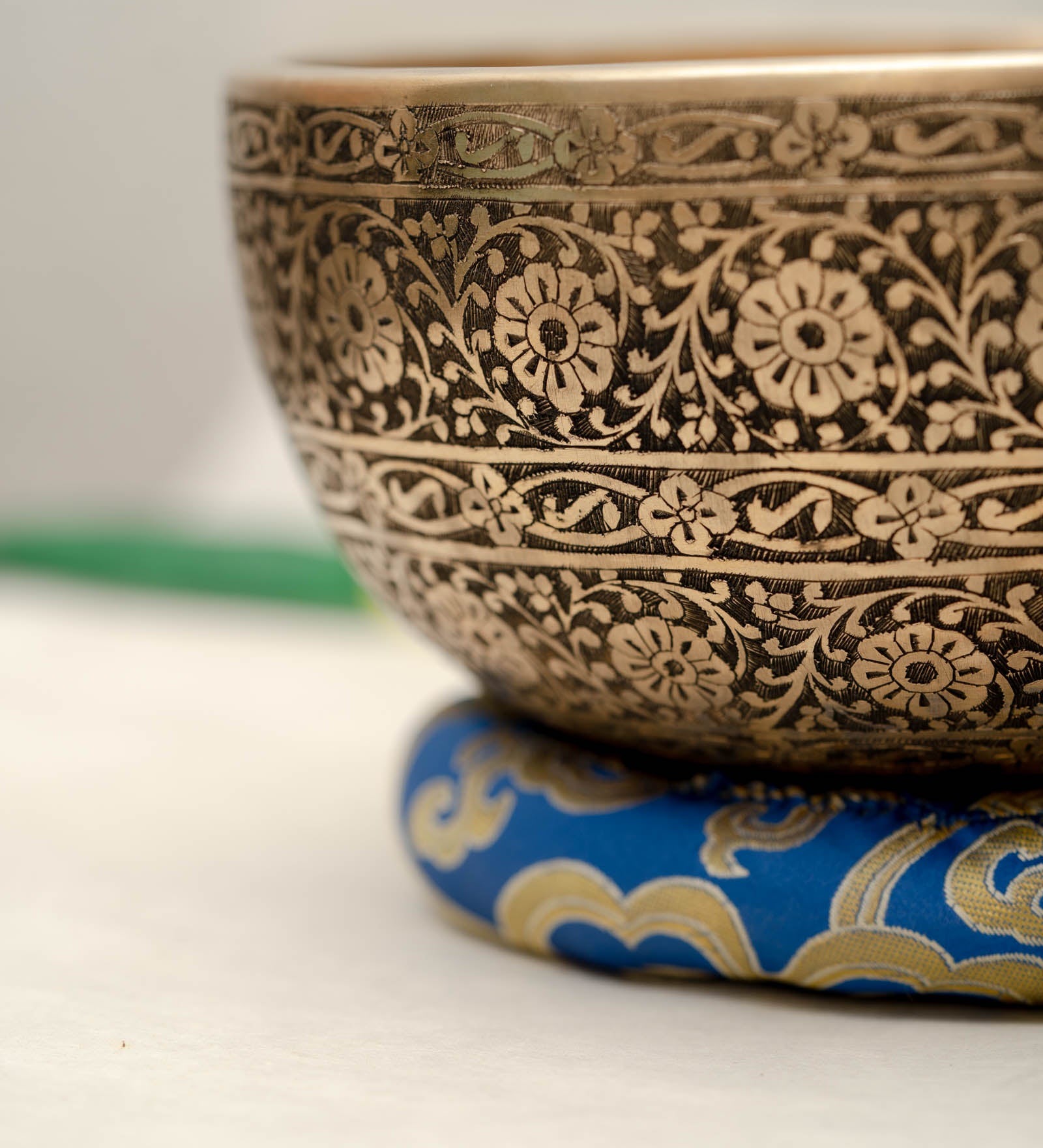 Full Lotus engraved  handmade Tibetan singing bowl with brass finish, wooden mallet, and cushion for Third Eye Chakra meditation