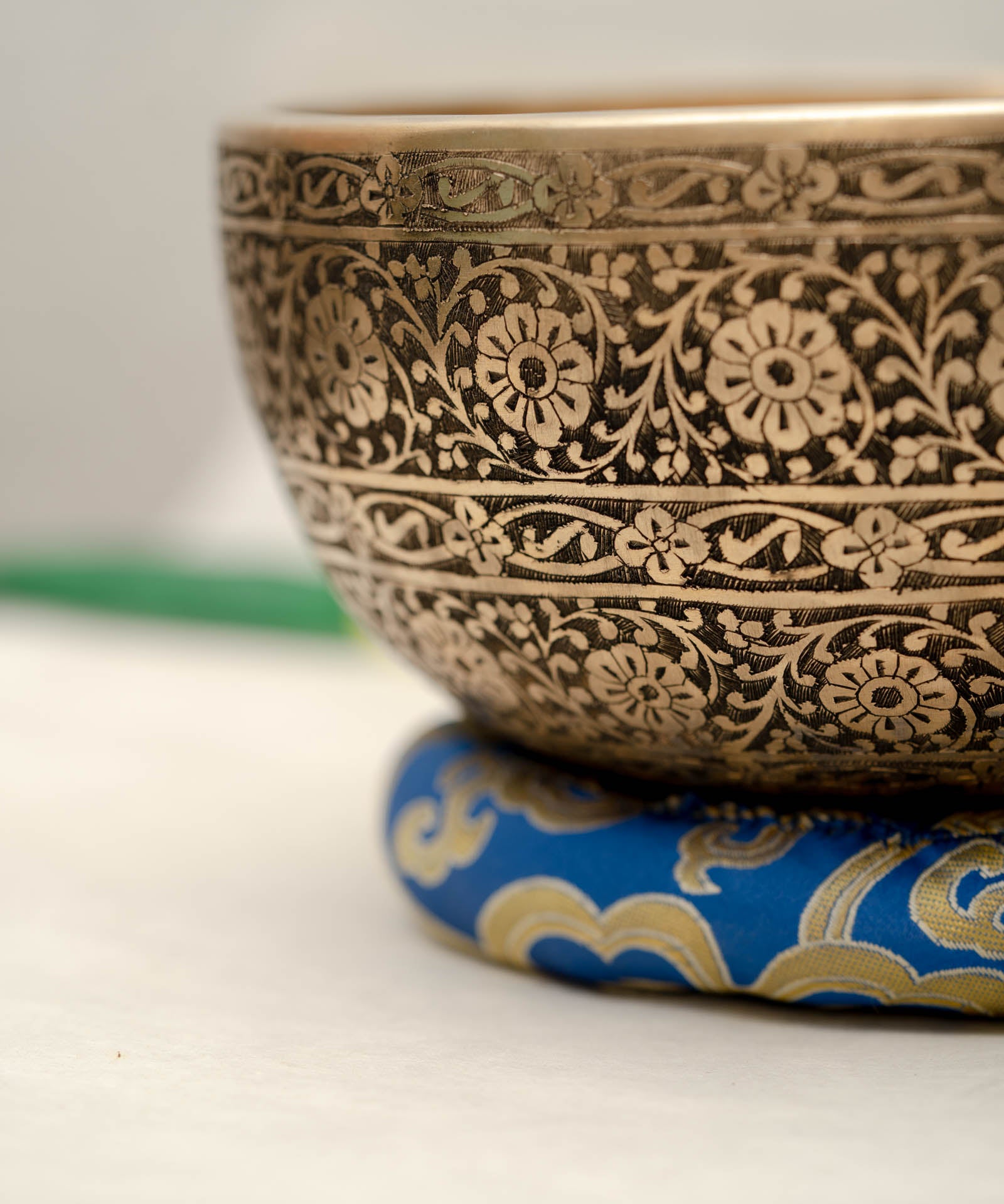 Full Lotus engraved  handmade Tibetan singing bowl with brass finish, wooden mallet, and cushion for Third Eye Chakra meditation