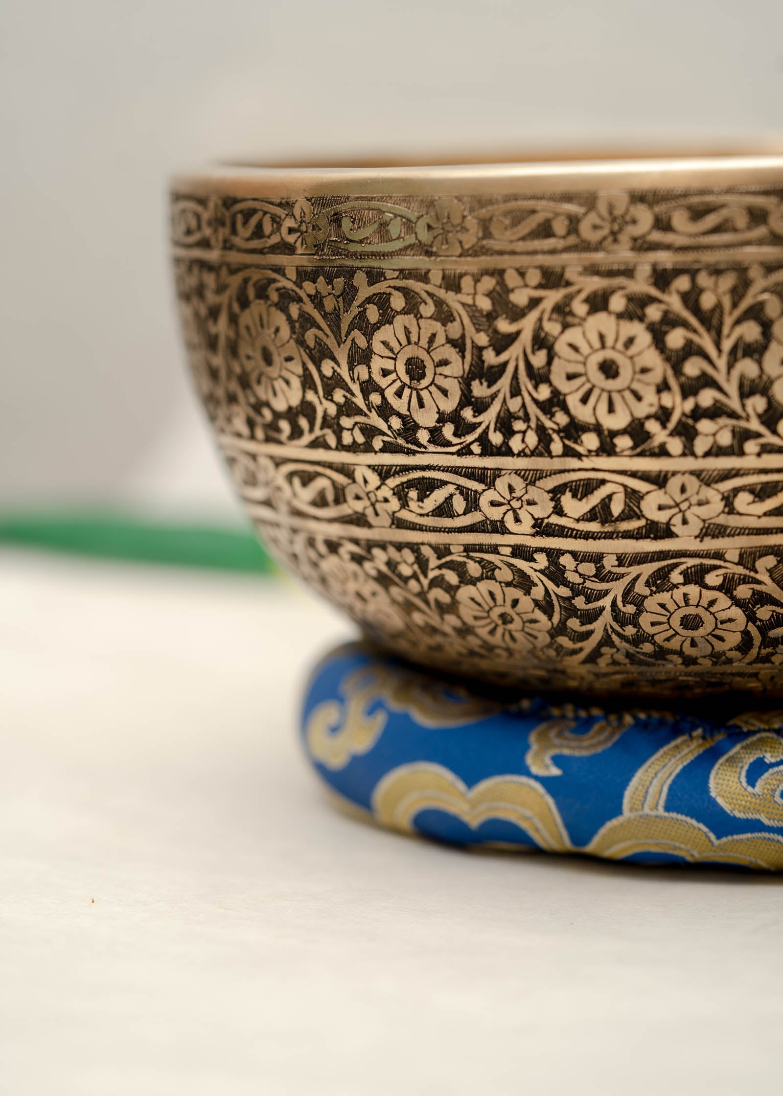 Full Lotus engraved  handmade Tibetan singing bowl with brass finish, wooden mallet, and cushion for Third Eye Chakra meditation