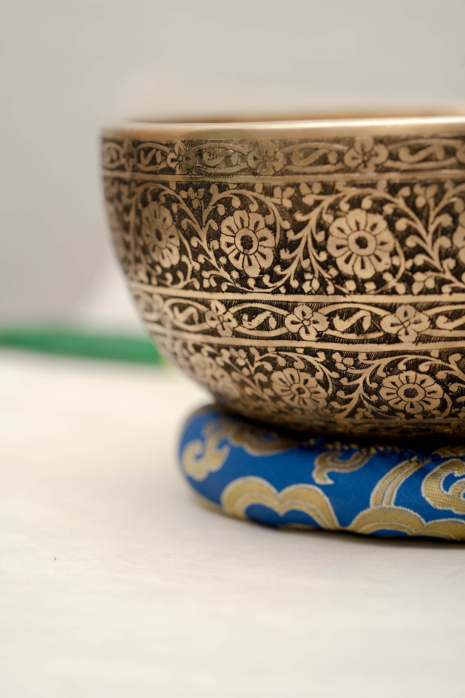 Full Lotus engraved  handmade Tibetan singing bowl with brass finish, wooden mallet, and cushion for Third Eye Chakra meditation