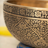 Lotus Floral Engraved handmade Tibetan singing bowl with brass carving, wooden mallet, and cushion for meditation and chakra healing