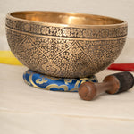 Lotus Floral Engraved handmade Tibetan singing bowl with brass carving, wooden mallet, and cushion for meditation and chakra healing