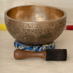 Handmade Himalayan floral engraved brass singing bowl tuned to B2 and C4 for chakra meditation and sound healing