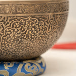 Handmade Himalayan floral engraved brass singing bowl tuned to B2 and C4 for chakra meditation and sound healing
