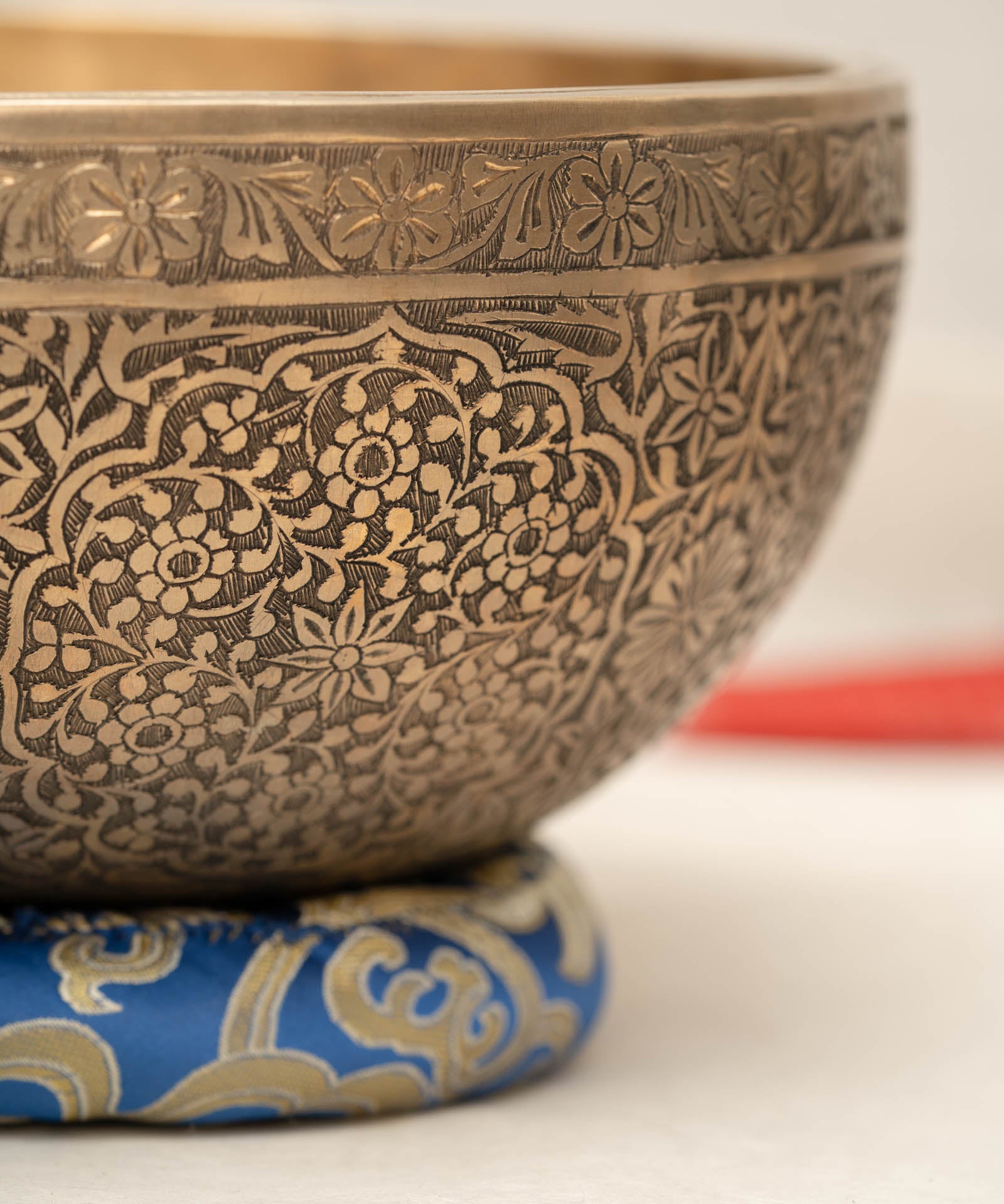Handmade Himalayan floral engraved brass singing bowl tuned to B2 and C4 for chakra meditation and sound healing