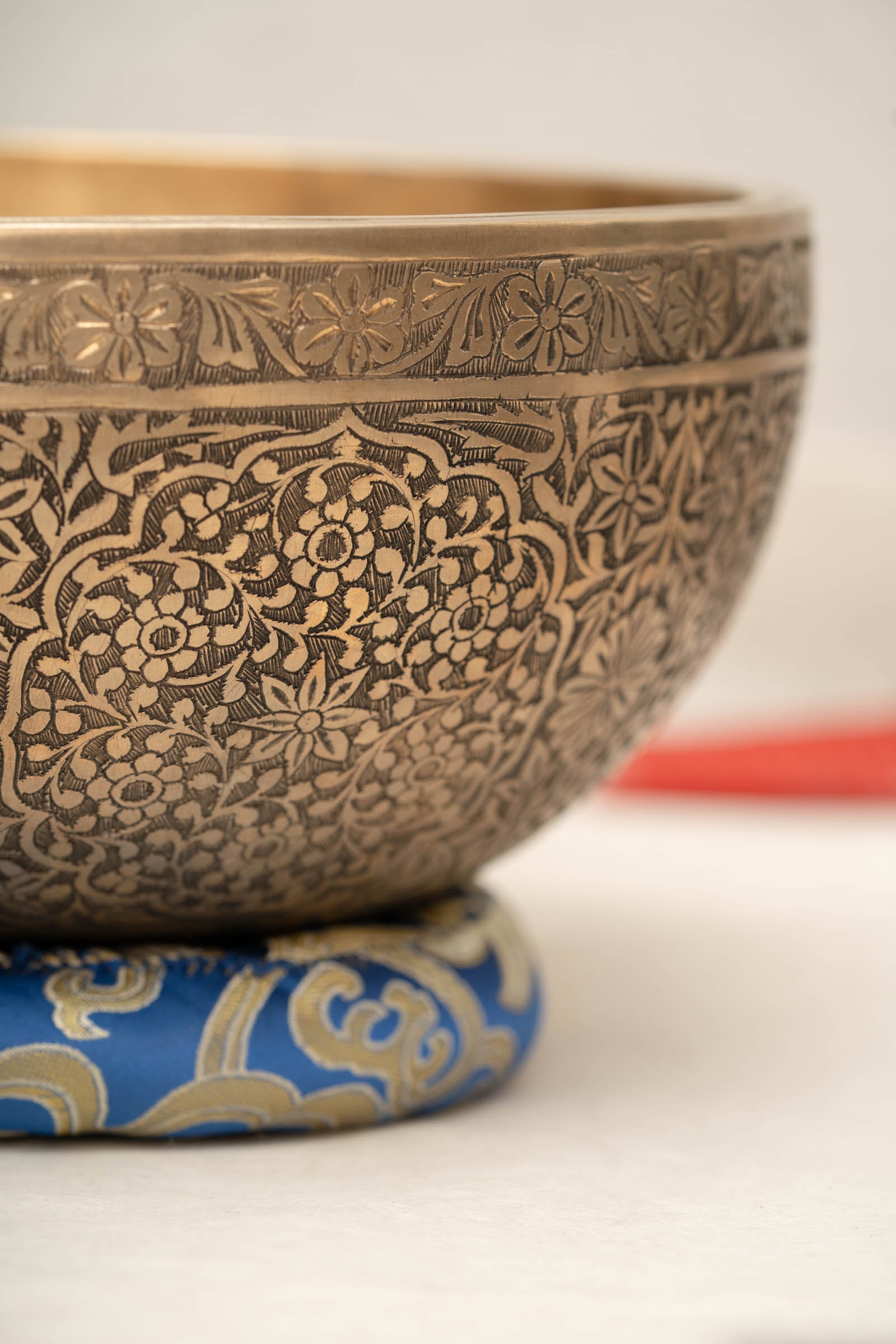 Handmade Himalayan floral engraved brass singing bowl tuned to B2 and C4 for chakra meditation and sound healing