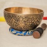 Handmade Himalayan Ganesha engraved brass singing bowl tuned to F3 and C5 for throat and heart chakra sound healing