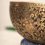 Handmade Himalayan Ganesha engraved brass singing bowl tuned to F3 and C5 for throat and heart chakra sound healing