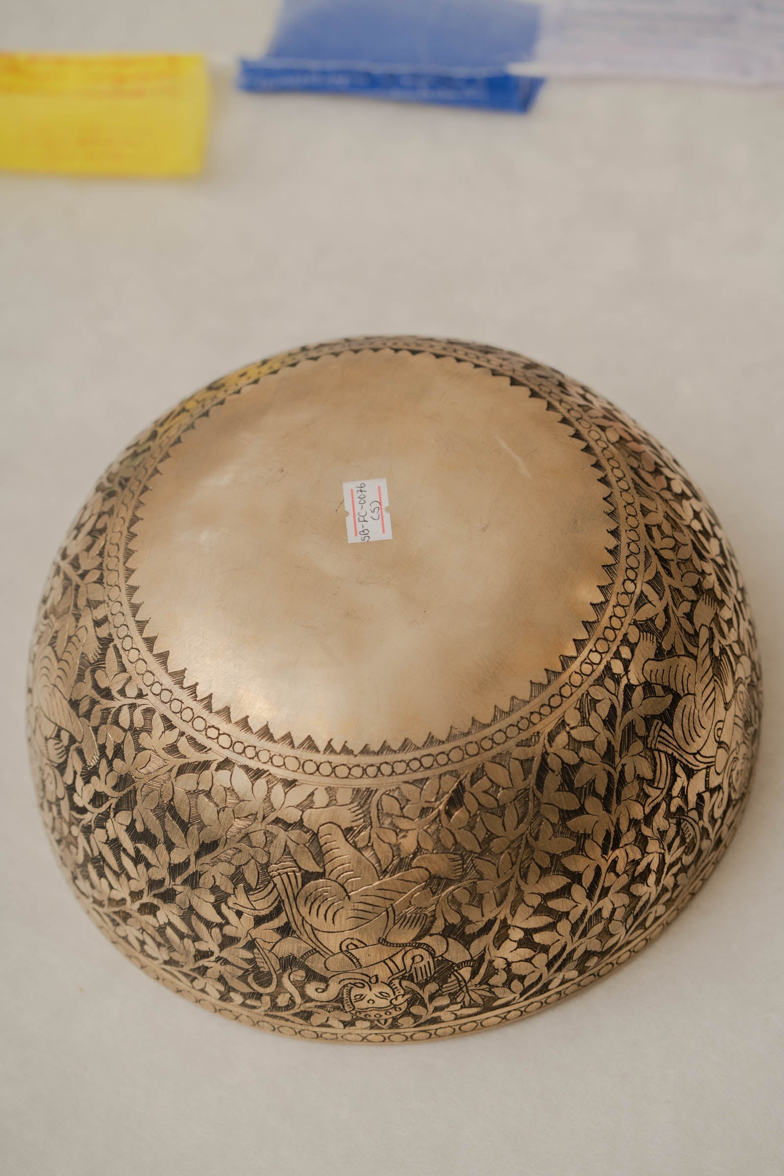 Handmade Himalayan Ganesha engraved brass singing bowl tuned to F3 and C5 for throat and heart chakra sound healing