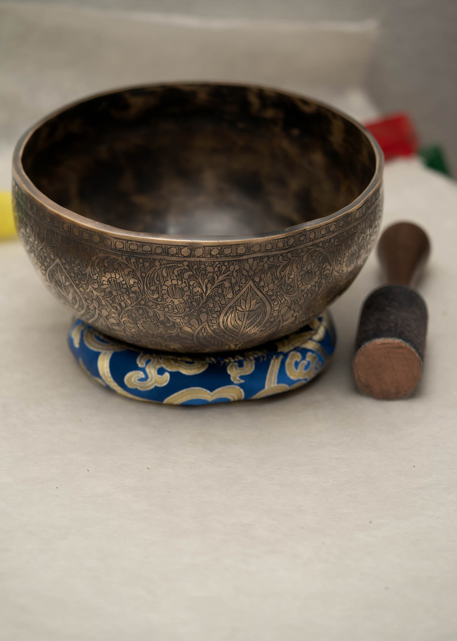 Handmade Himalayan traditional floral ornamental singing bowl carved design tuned to F3 and C5 for throat chakra sound healing