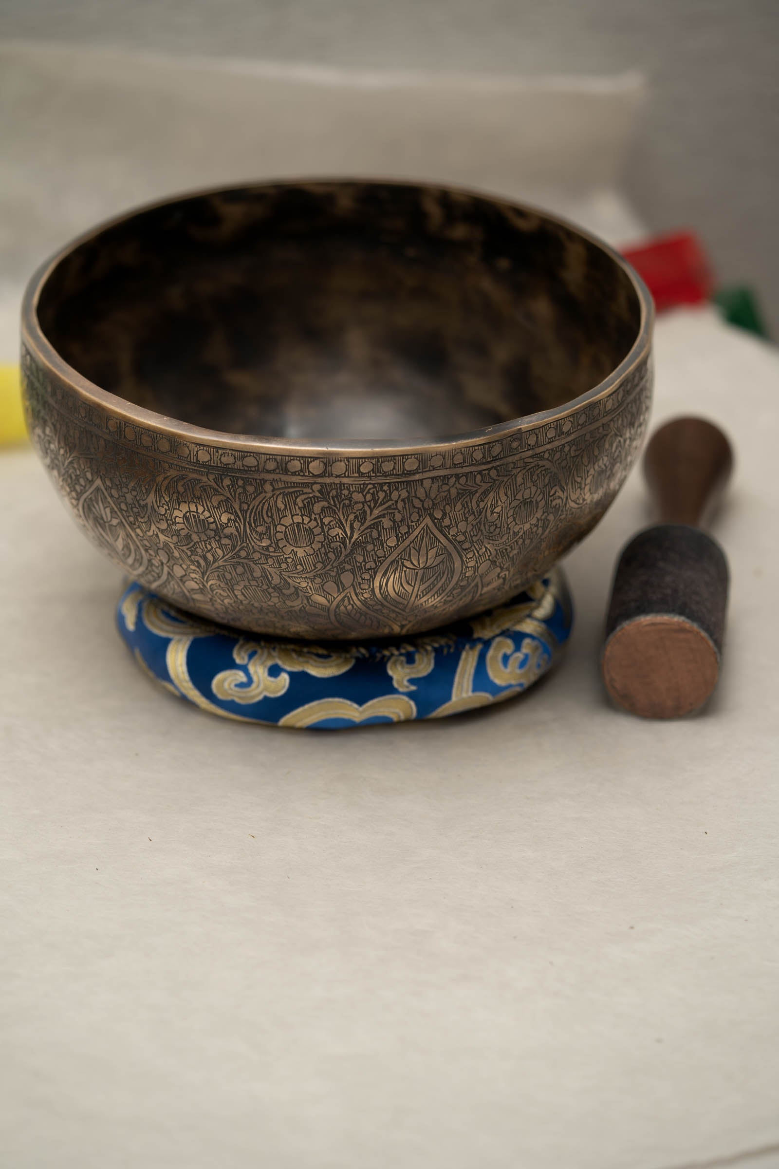 Handmade Himalayan traditional floral ornamental singing bowl carved design tuned to F3 and C5 for throat chakra sound healing