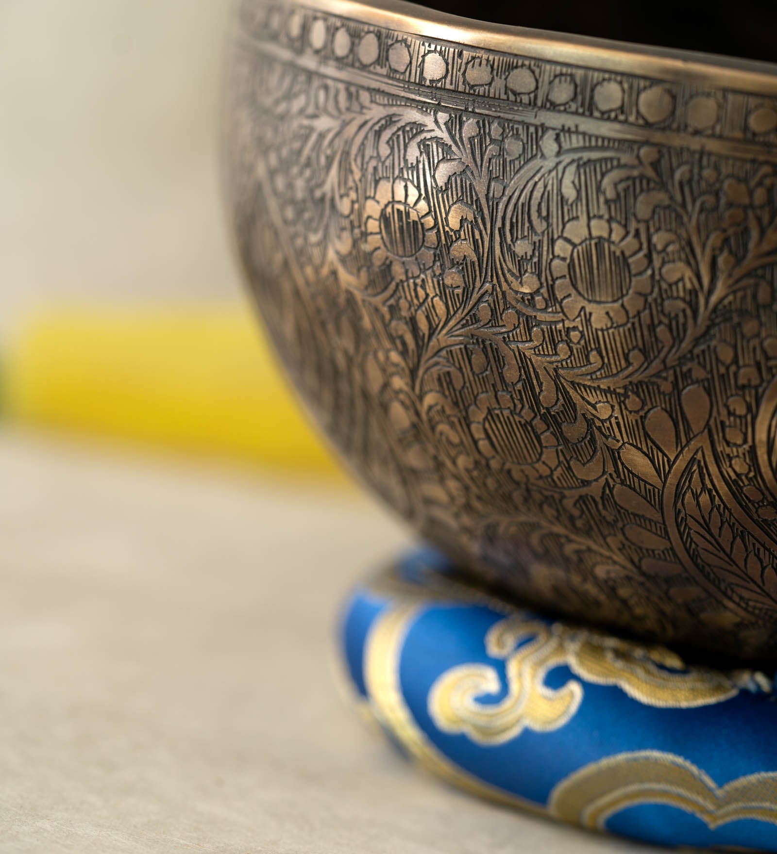 Handmade Himalayan traditional floral ornamental singing bowl carved design tuned to F3 and C5 for throat chakra sound healing