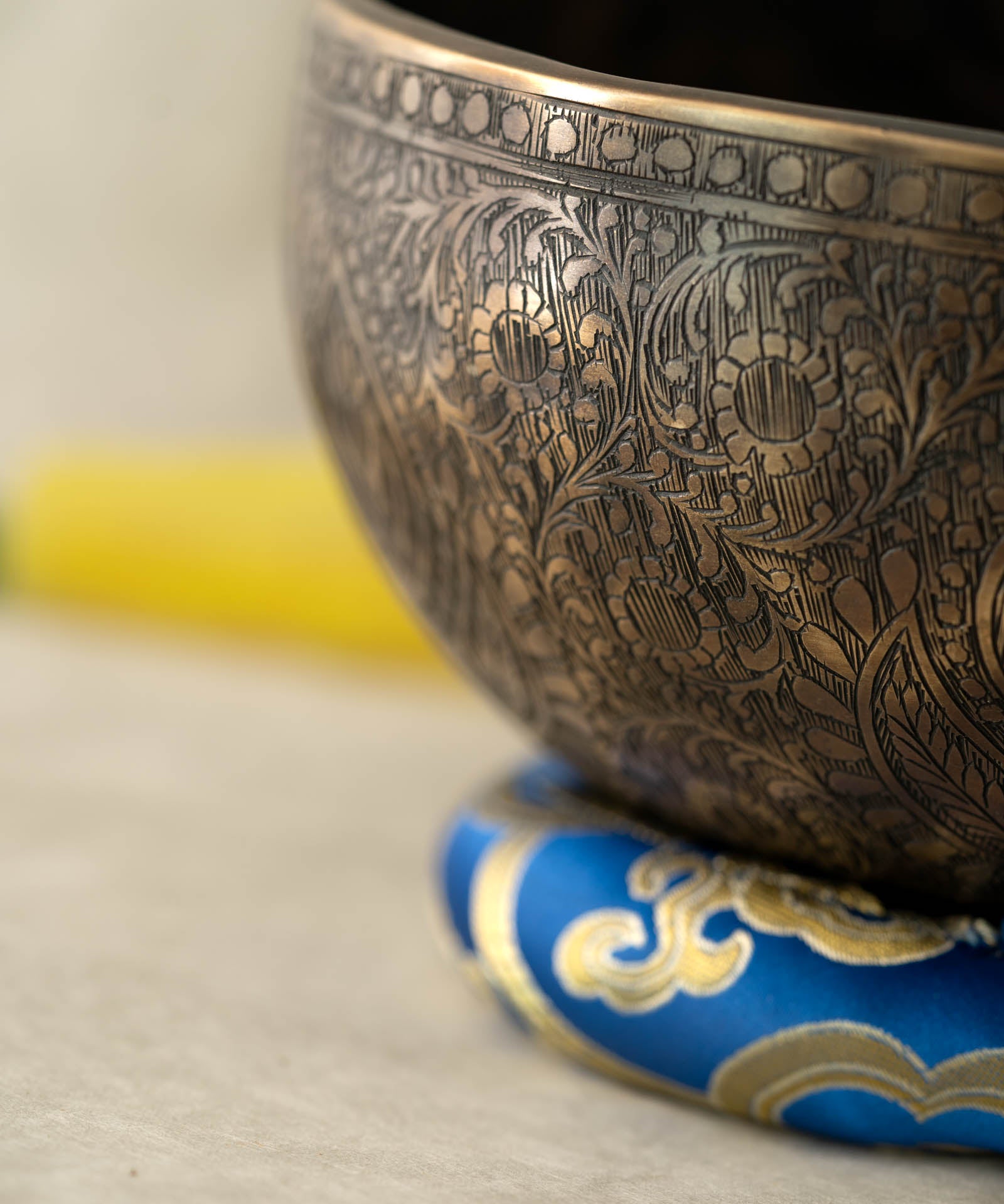Handmade Himalayan traditional floral ornamental singing bowl carved design tuned to F3 and C5 for throat chakra sound healing