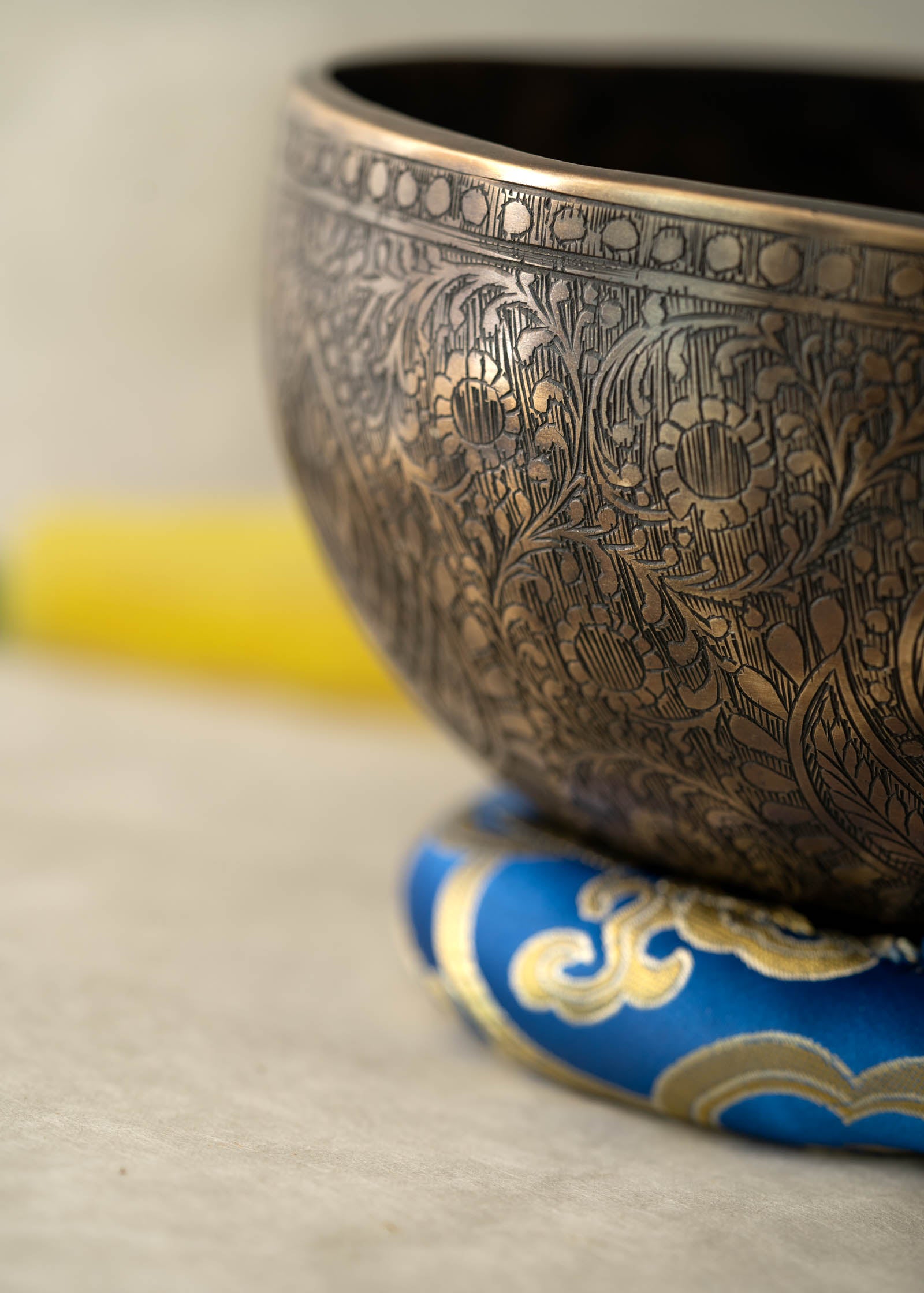 Handmade Himalayan traditional floral ornamental singing bowl carved design tuned to F3 and C5 for throat chakra sound healing