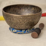 Handmade Himalayan Kashmiri-style singing bowl engraved design tuned to D3 and D2 for Sacral Chakra meditation and sound healing
