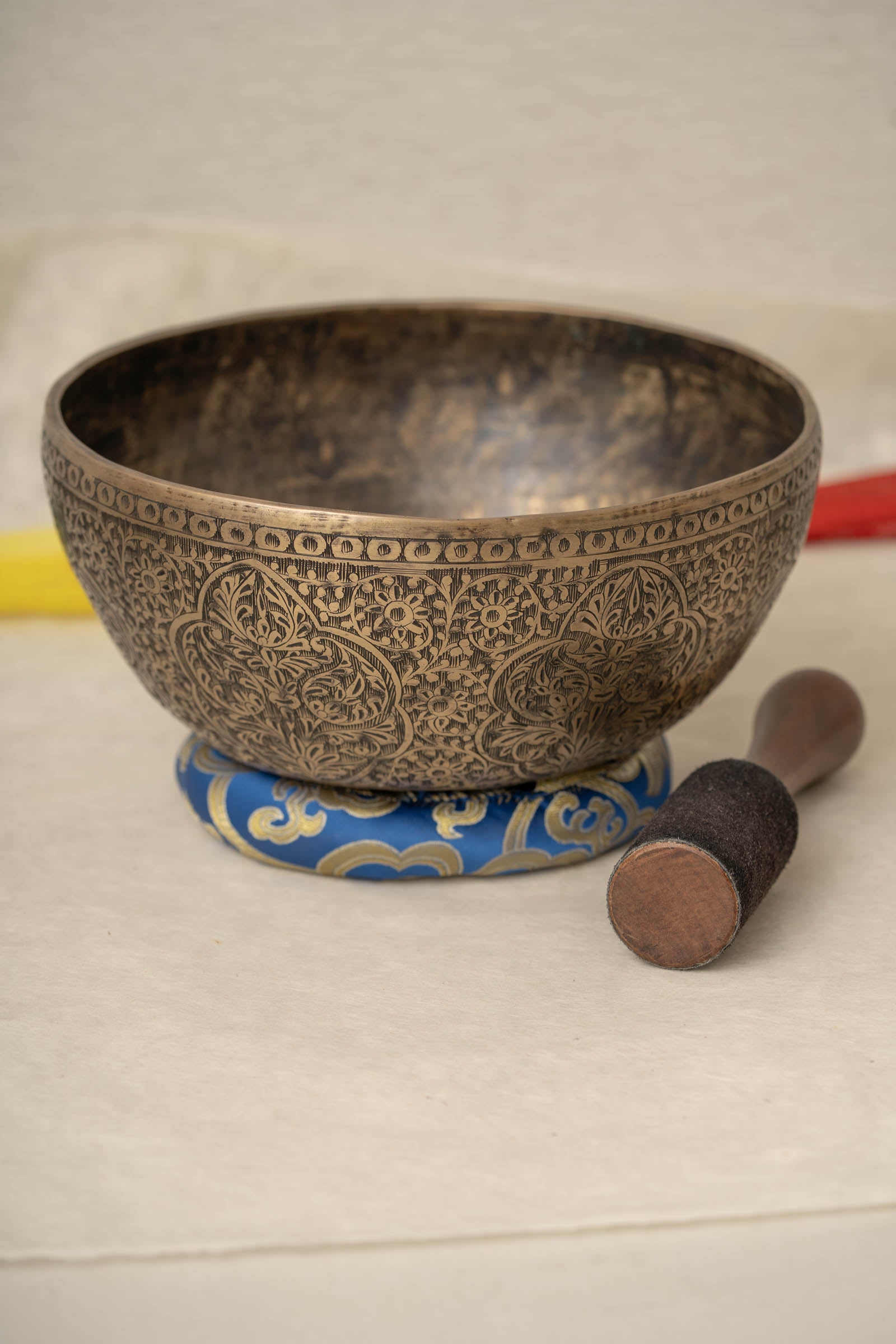 Handmade Himalayan Kashmiri-style singing bowl engraved design tuned to D3 and D2 for Sacral Chakra meditation and sound healing