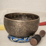 Handmade Himalayan lotus mandala engraved singing bowl tuned to F3 for meditation and sound healing