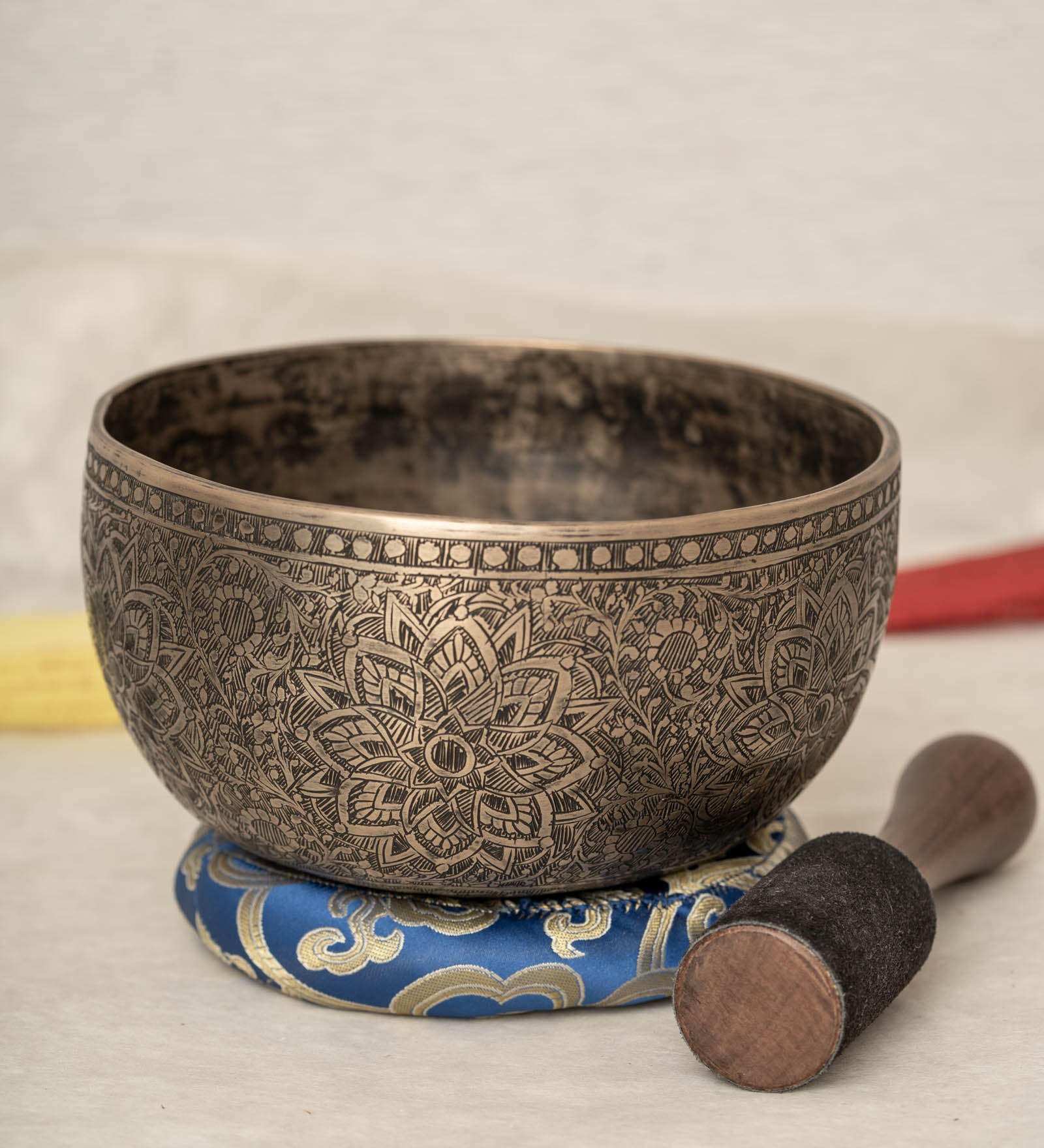 Handmade Himalayan lotus mandala engraved singing bowl tuned to F3 for meditation and sound healing