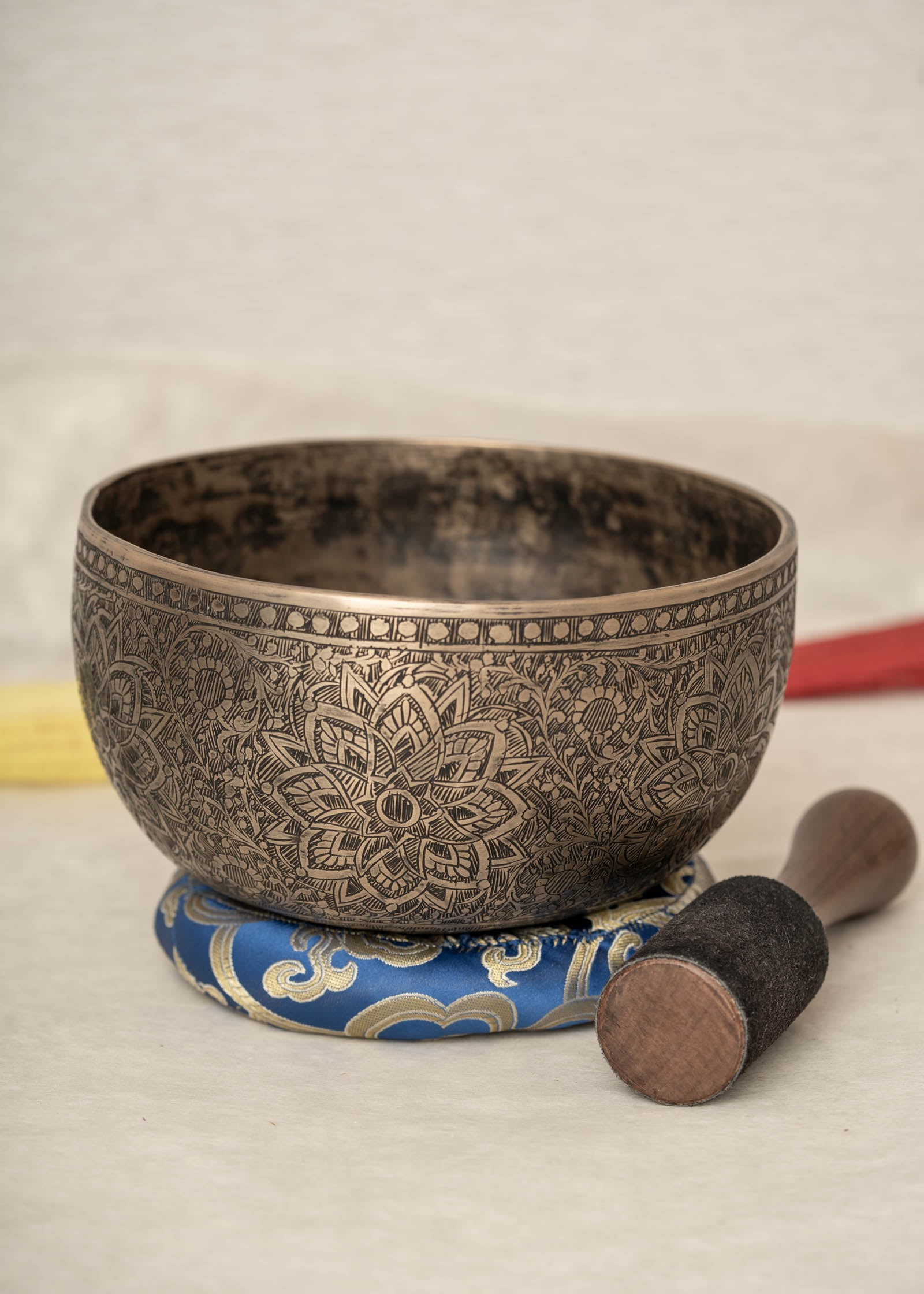 Handmade Himalayan lotus mandala engraved singing bowl tuned to F3 for meditation and sound healing