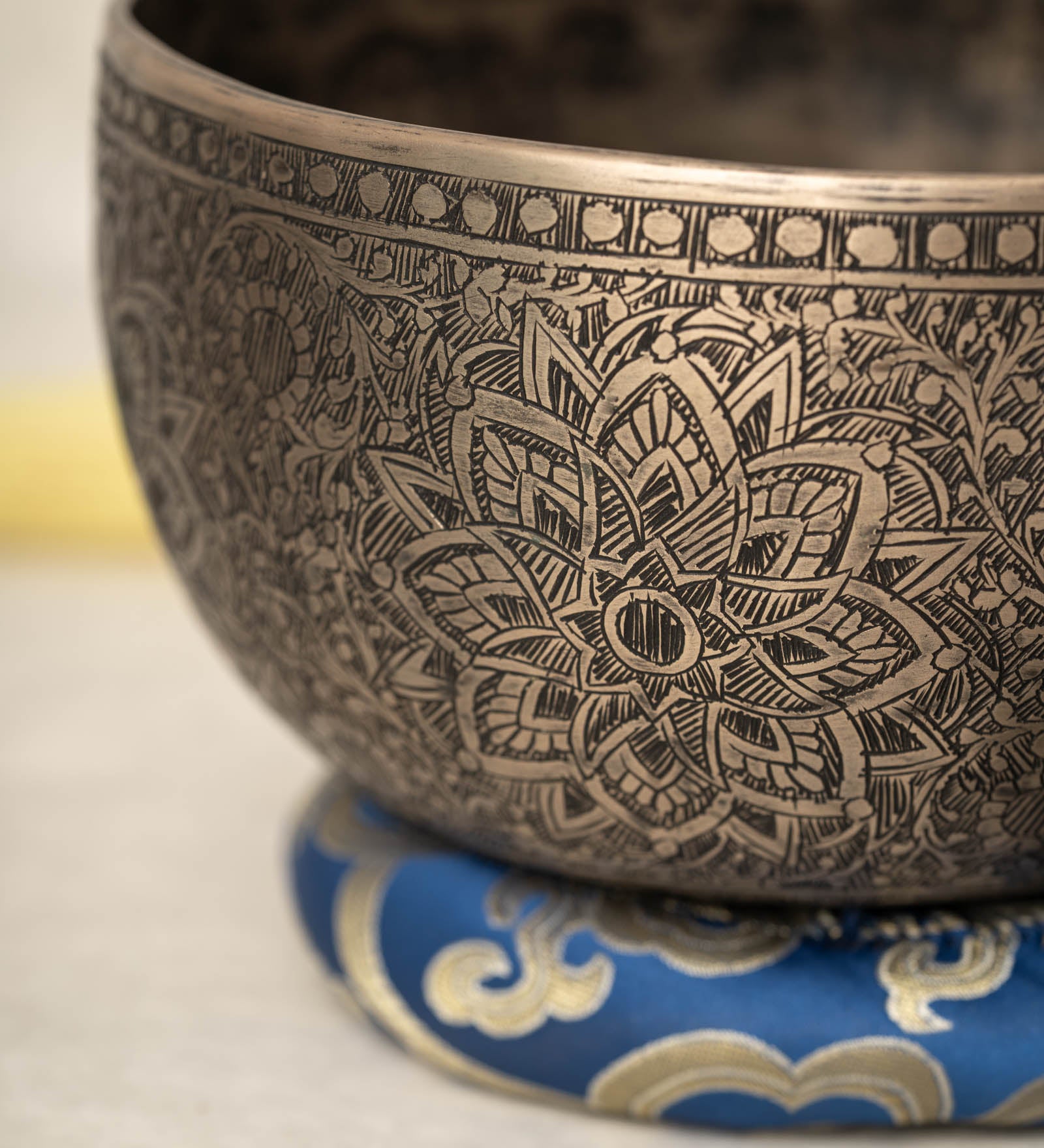 Handmade Himalayan lotus mandala engraved singing bowl tuned to F3 for meditation and sound healing