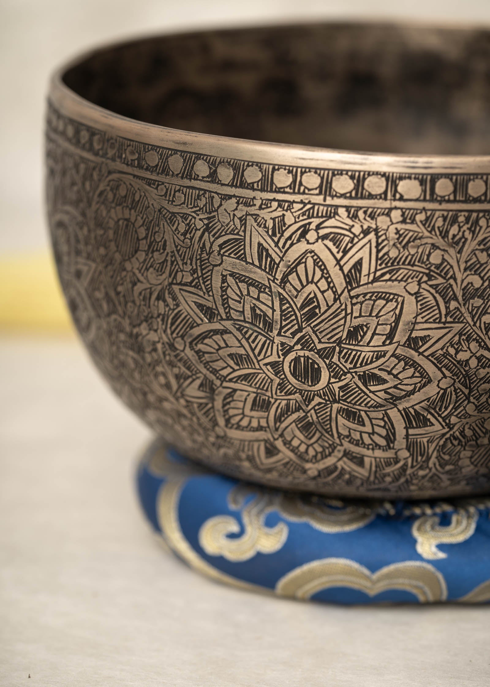 Handmade Himalayan lotus mandala engraved singing bowl tuned to F3 for meditation and sound healing