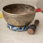 Handmade Himalayan peacock singing bowl carved design tuned to F3 for meditation and sound healing