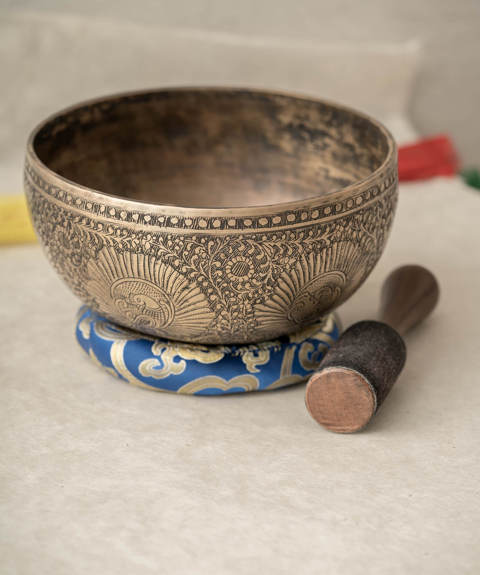 Handmade Himalayan peacock singing bowl carved design tuned to F3 for meditation and sound healing