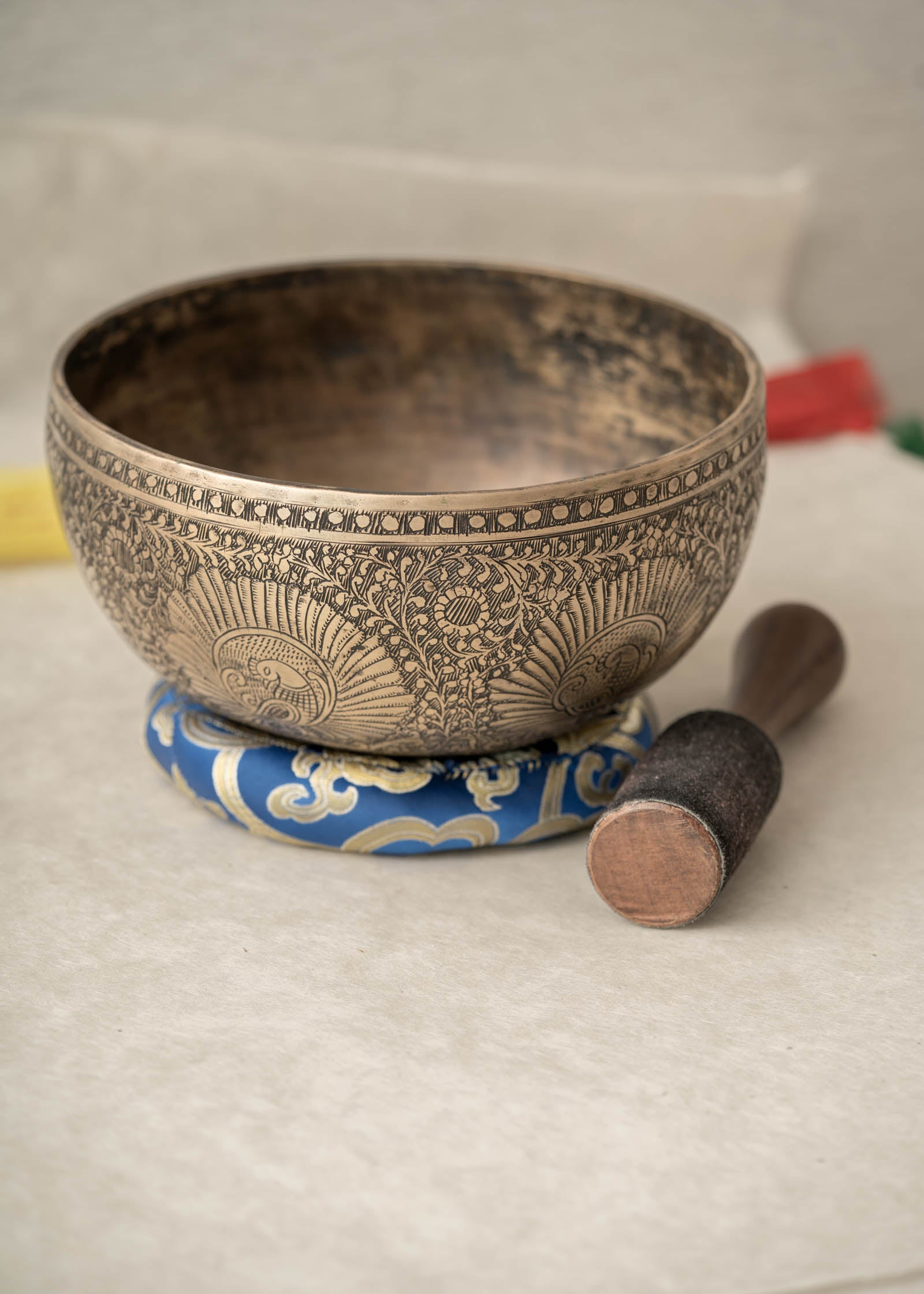 Handmade Himalayan peacock singing bowl carved design tuned to F3 for meditation and sound healing
