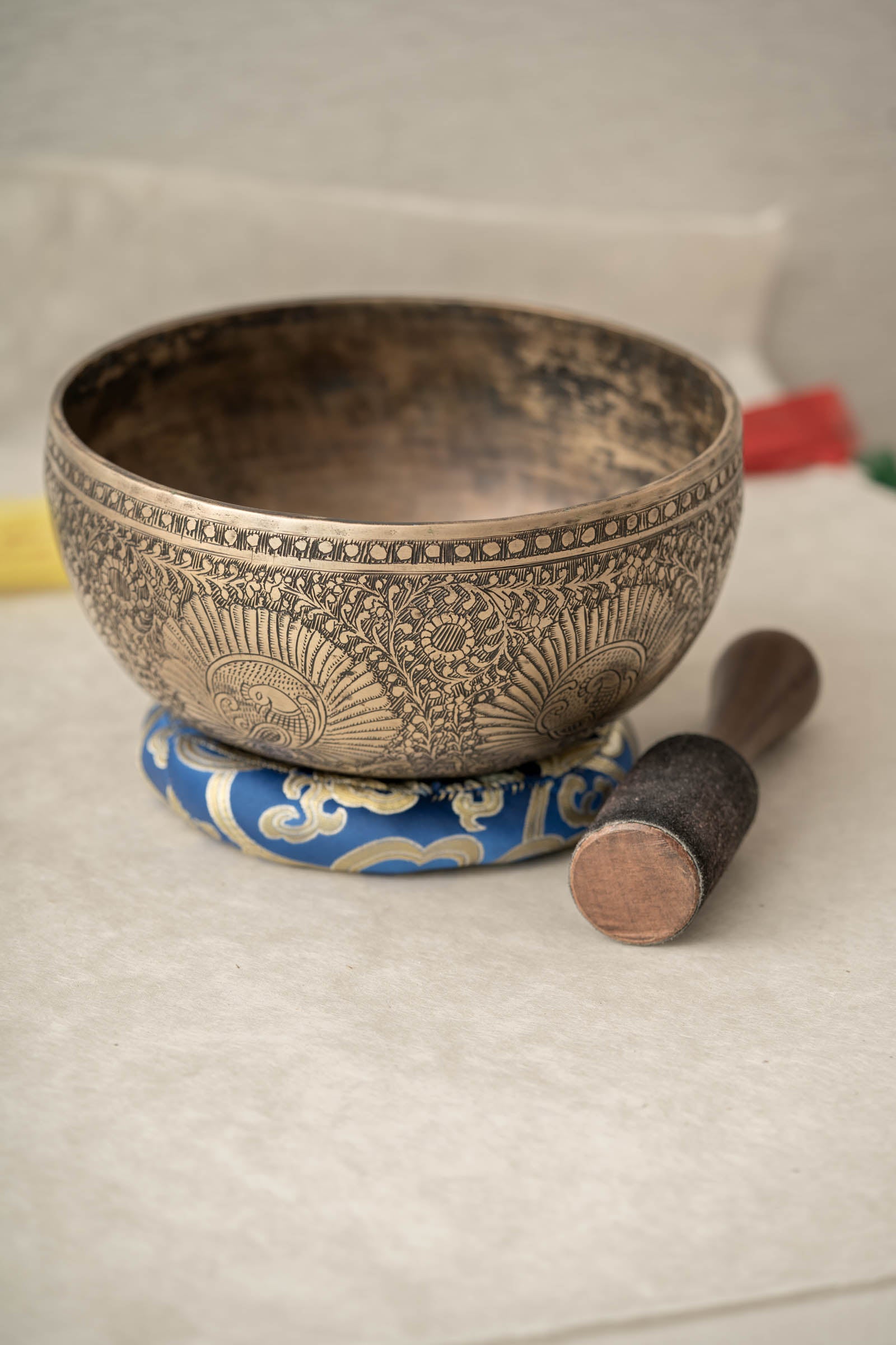 Handmade Himalayan peacock singing bowl carved design tuned to F3 for meditation and sound healing