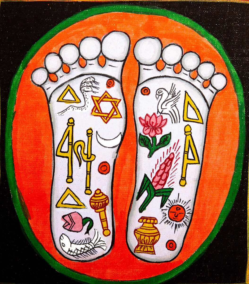 Painting of two sacred feet with colorful spiritual symbols