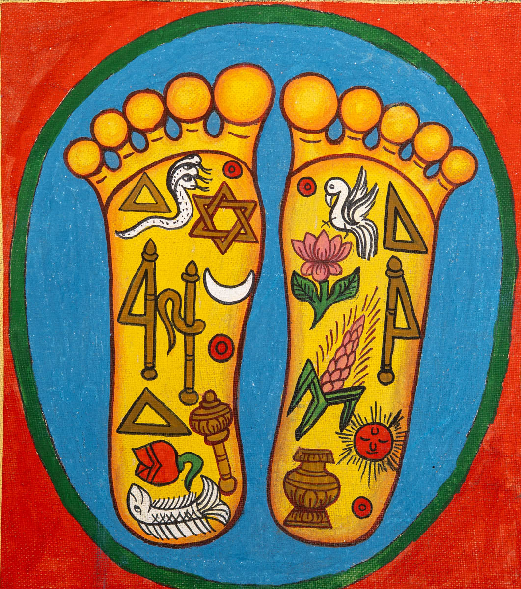 Painting of two sacred feet with colorful spiritual symbols