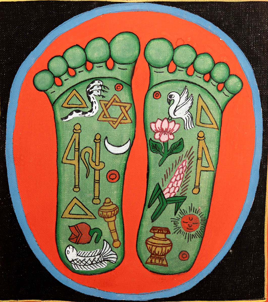 Painting of two sacred feet with colorful spiritual symbols