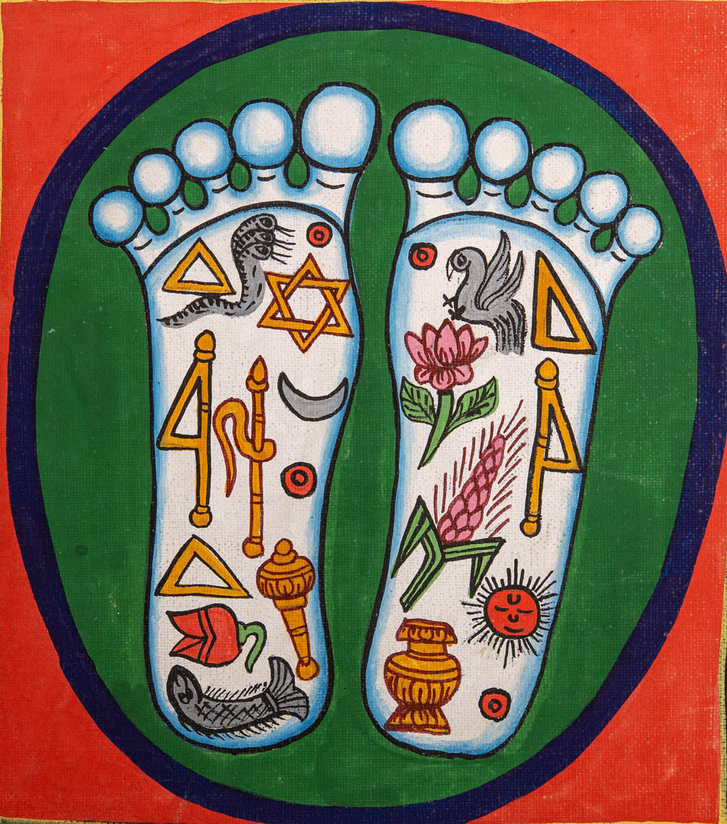 Painting of two sacred feet with colorful spiritual symbols
