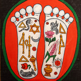 Painting of two sacred feet with colorful spiritual symbols