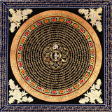 Handcrafted Tibetan mantra mandala thangka with gold script, floral corner motifs, and ornate circular design on a black background