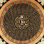 Handcrafted Tibetan mantra mandala thangka with gold script, floral corner motifs, and ornate circular design on a black background