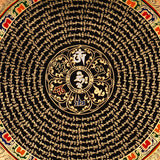 Handcrafted Tibetan mantra mandala thangka with gold script, floral corner motifs, and ornate circular design on a black background