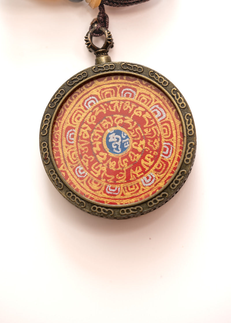 Tibetan Om Ghau Thangka with Locket
