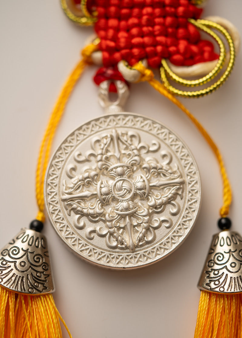 Tassel-Adorned Endless Knot Locket